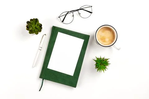 Light postcard mockup for design presentation on a white workplace with coffee Stock Photos