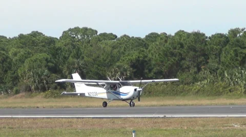 Light private airplane on the ground Stock Footage 33524369