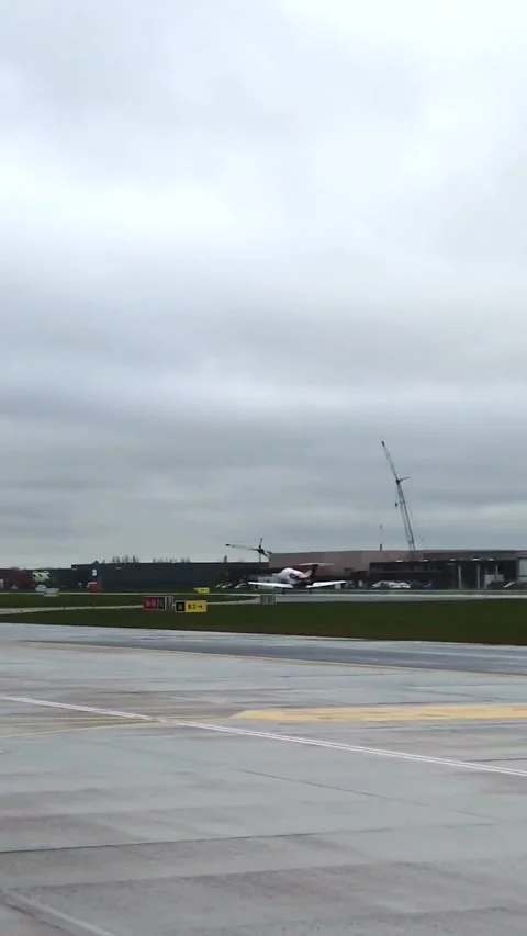 Light Private Jet Powerful Departure out of regional local airport airfield Stock Footage 280754675