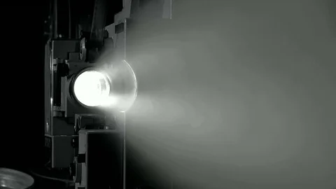 Light projector ray in dark room, changing beam in dusty air Stock Footage 70780222