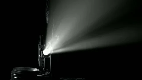 Light projector ray in dark room, changing beam in dusty air Stock Footage 70832596