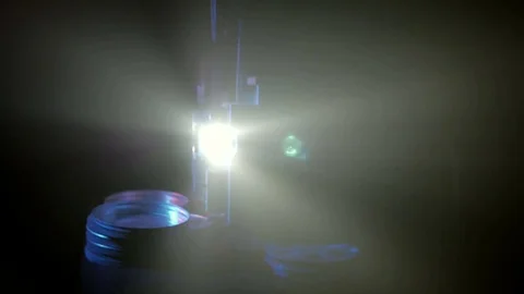 Light projector ray in dark room, changing beam in dusty air Stock Footage 70832644