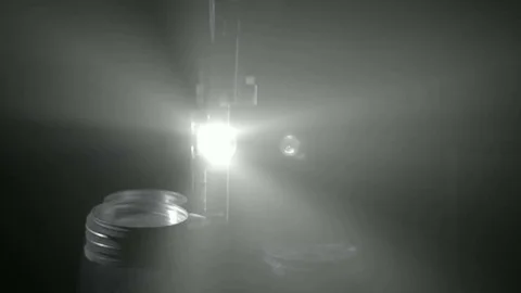 Light projector ray in dark room, changing beam in dusty air Stock Footage 70832781