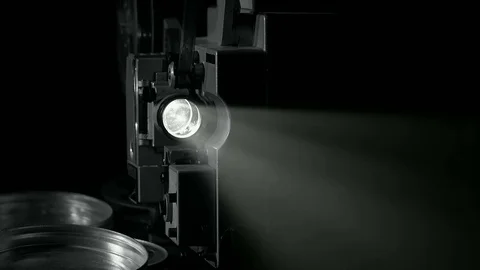 Light projector ray in dark room, changing beam in dusty air Stock Footage 70834507