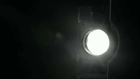 Light projector ray in dark room Stock Footage 70837283