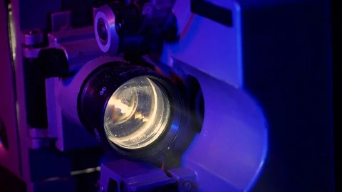 Light projector ray in dark room Stock Footage 70837296