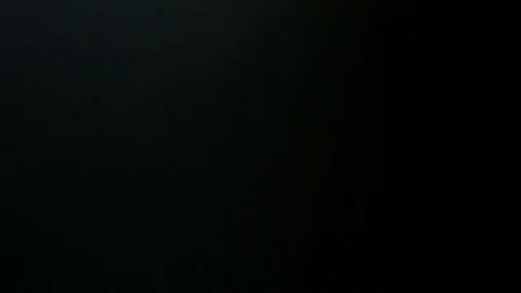 Light pulses and glows.beautiful light leak in 4K hd quality on dark background  Video stock 80158316