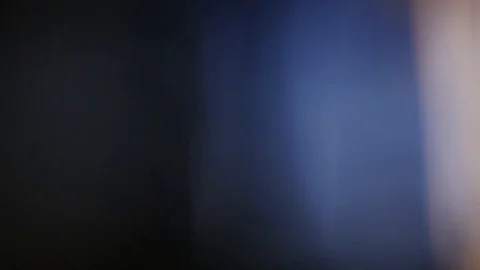 Light pulses and glows.beautiful light leak in 4K hd quality on dark background  Stock-Footage 80159281