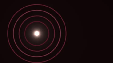 Light pulses radiate in concentric circles against a dark Stock Footage 338300586