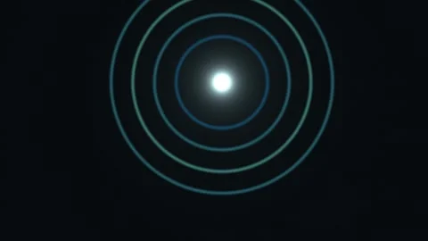 Light radiates with a circle pattern in dark background Stock Footage 339088633