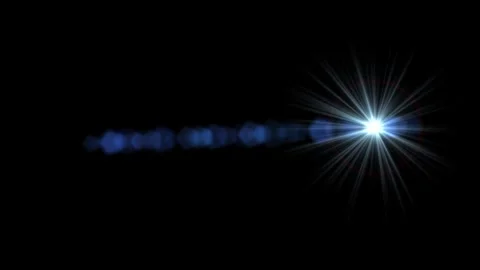 Light radiates starburst effect against black background Video stock 328274210