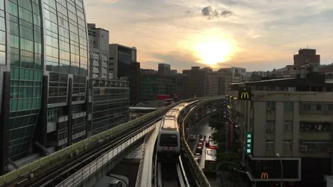 Light rail through Taipeicity scape at sunset.  Stock Footage 158782689