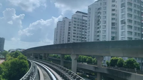 Light Rail Train coming into station Stock Footage 247730625