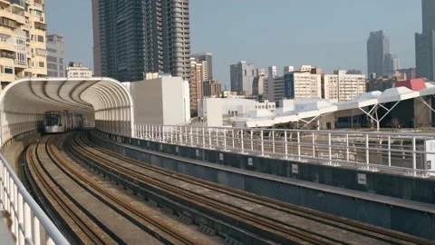 The light rail train drive past Pier-2 Art Center in Kaohsiung, Taiwan. Stock Footage 195097506