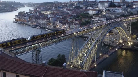 Light rail train moving on Luis Bridge at night at night Stock Footage 293392392