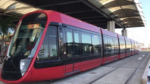 Light rail tram leaving Nice Airport Stock Footage 119926813