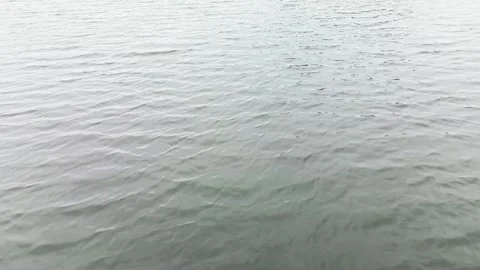 Light Rain Falling on Blue Lake. Rainy Season in Tropical Countries. Tropic.. Stock Footage 295759236