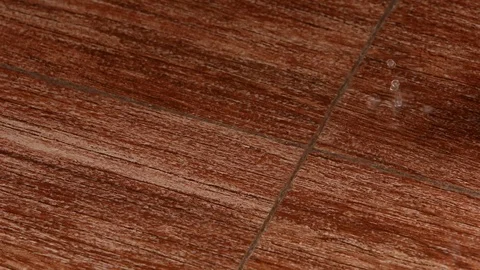 Light Rain Falling on a Deck Stock Footage 124325165