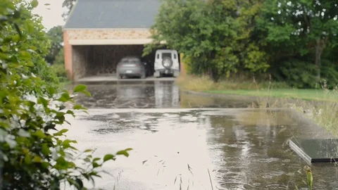 Light rain falling in front of garage Stock Footage 94097173
