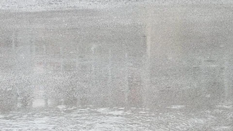 Light rain falling on a hot summer day Stock Footage 140032566