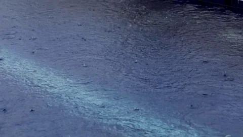 Light Rain Falling on a Pool Video stock 124325142