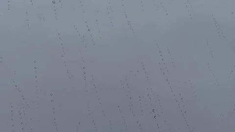 Light Rain Seen Through Window Glass Background – 4K 動画素材 329893539
