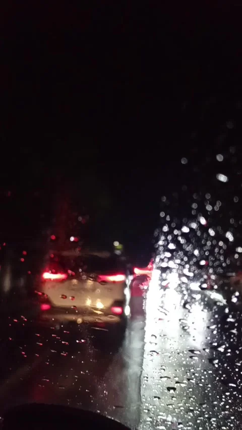 Light rain wet the outside of the car window Stock Footage 309306491