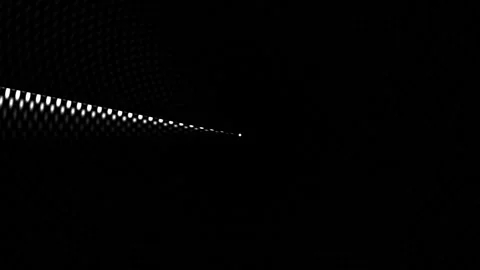 Light ray cutting through darkness in a void space Stock Footage 339370055