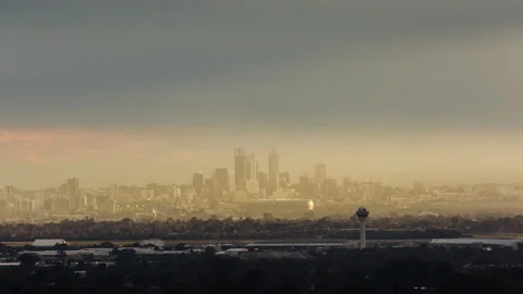Light ray shining on Perth City and Airport Timelapse Stock Footage 139952136