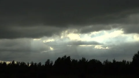 Light rays and storm comes over 4K Video stock 77011597