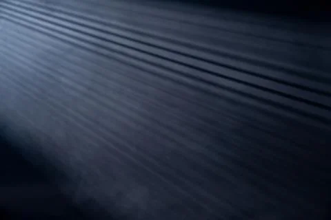 Light rays coming through the blinds isolated on black background Stock Photos