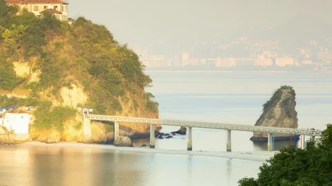 Light rays pierce through the clouds to reveal Half Dome at sunset in Niteroi Stock Footage 91667486