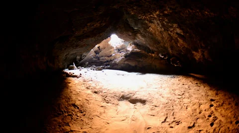 Light Rays Shine inside of Lava Tube Cave - Time Lapse Stock Footage 28454612