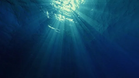 Light rays shining through. Great popular marine Background Stock Footage 70896864