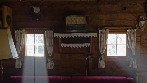 Light rays shining through windows in old wooden house 스톡 동영상 70090928