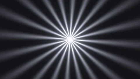 Light rays spread from a central source in a dark setting Stock Footage 338010392
