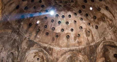 Light rays through the Ottoman old hammam ceiling Stock Photos