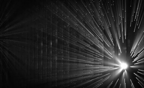 Light rays through small holes in a dark space Foto stock