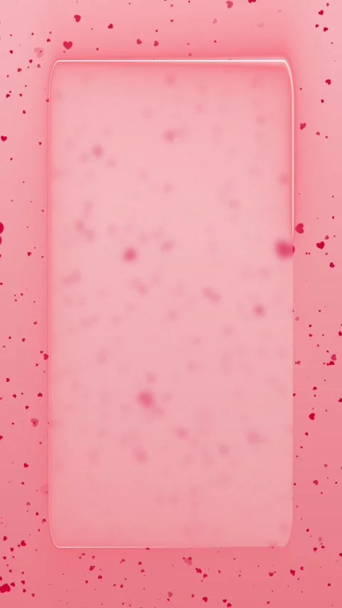 On a light red background, red hearts fall in the center of a frosted glass Stock Footage 314797060