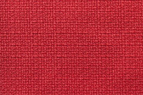 Light red background from a textile material. Fabric with natural texture. Ba Stock Photos