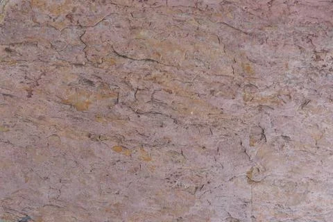 Light red brown and rough surface of rock. Stock Photos