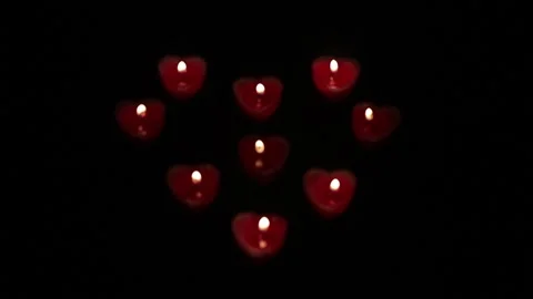 Light a red candles with heart Stock Footage 155551026