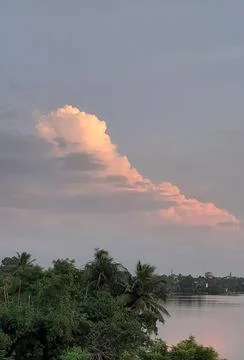 Light Red Cloud in the Blue Sky Stock Photos