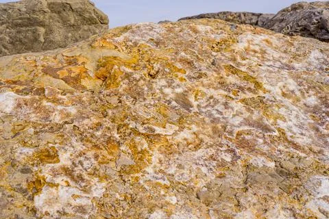 Light red-orange stone texture. Red orange grunge background. Mountain textur Stock Photos