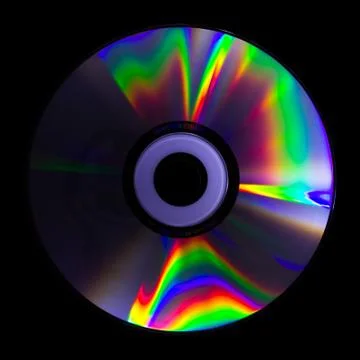 The light reflected from a cd is a collection of psychedelic colors Stock Photos