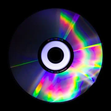 The light reflected from a cd is a collection of psychedelic colors Stock Photos