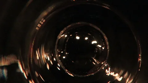 Light reflected in a glass of water. Stock Footage 99611094