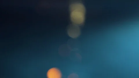 Light reflected off a swimming pool at night using an out of focus lens Stock Footage 113182779