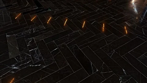 Light reflecting on black marble floor with herringbone pattern Stock-Footage 312122600