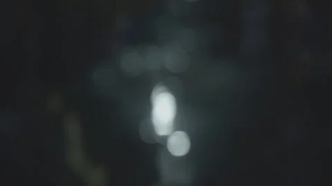 Light reflecting off water at night- soft focus Видео 244656580